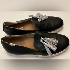 Sylvia Noster Sleek Black and Silver Tassel Loafers